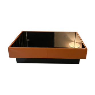 Table basse en cuir caramel et verre noir
