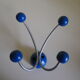 Grey metal wall hook, 4 wooden hangers