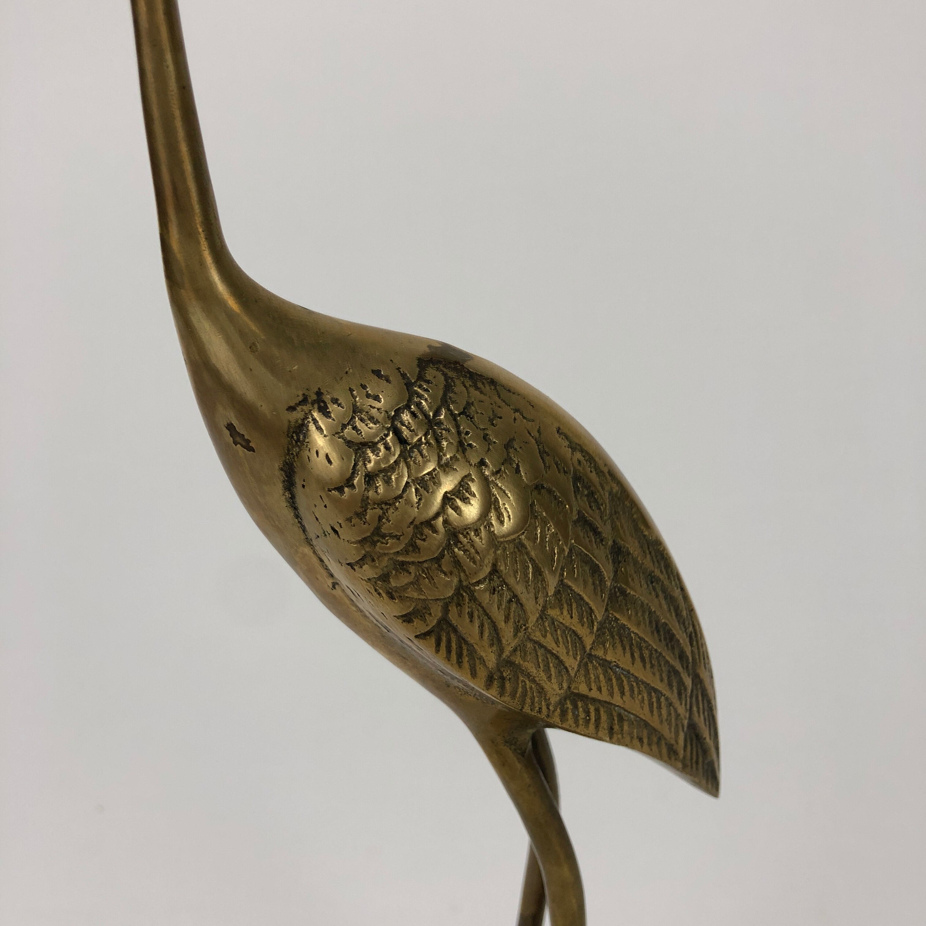 Brass heron couple