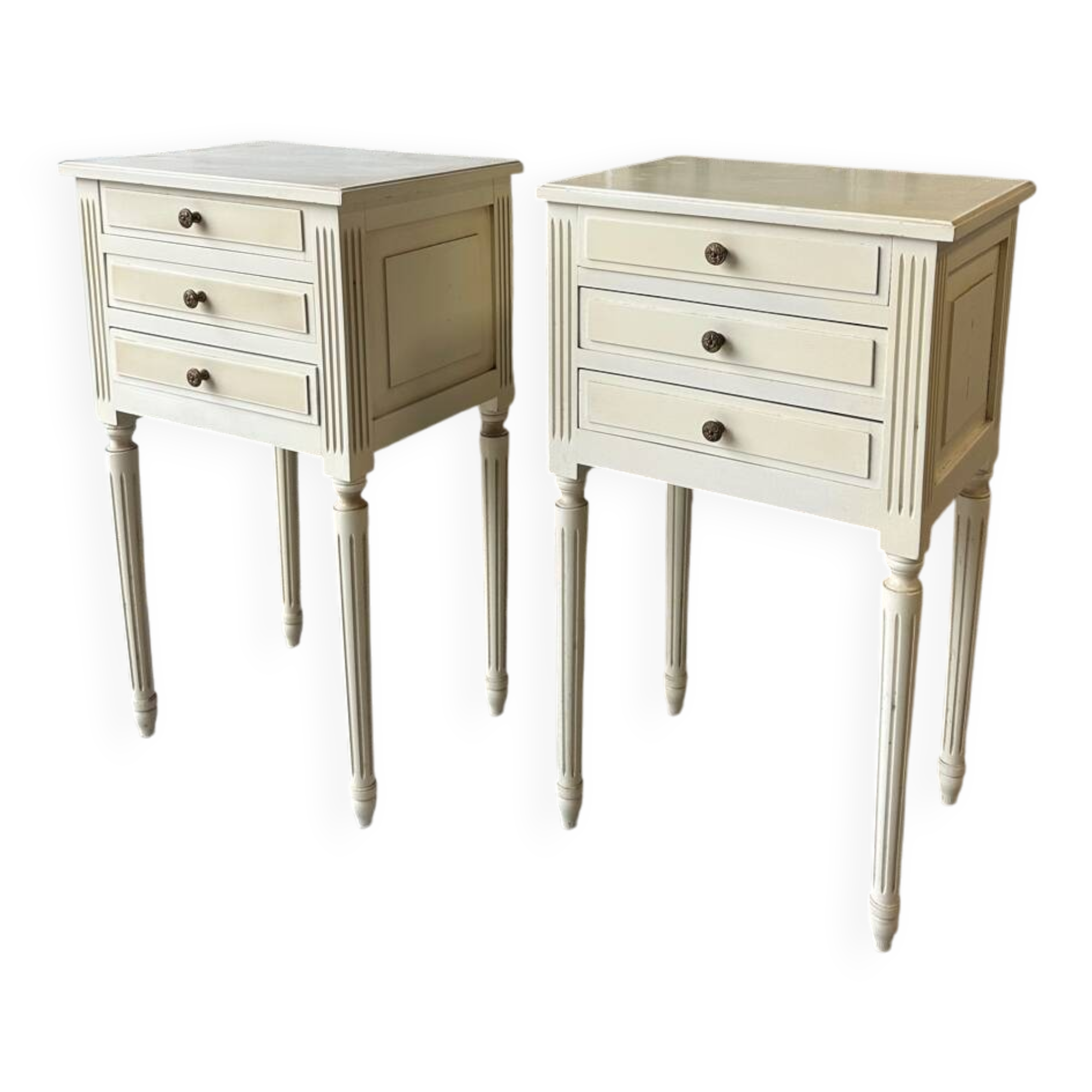 Pair of Louis XVI style bedside tables in white lacquered wood