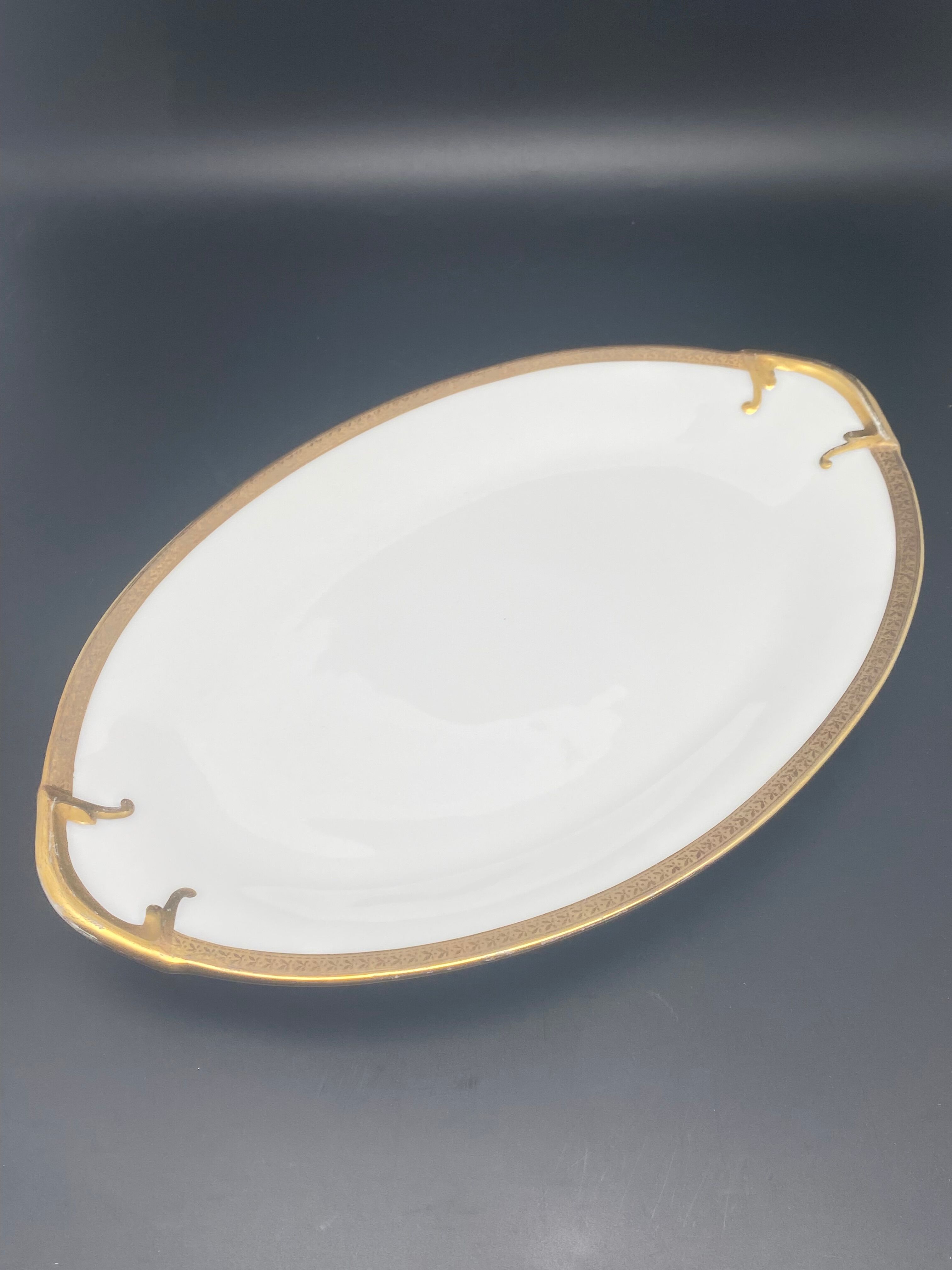 Oval flat Limoges golden tower