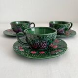 3 earthenware cups and saucers in barbotine fruit decor Salins vintage