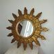 Miroir soleil bois sculpté doré