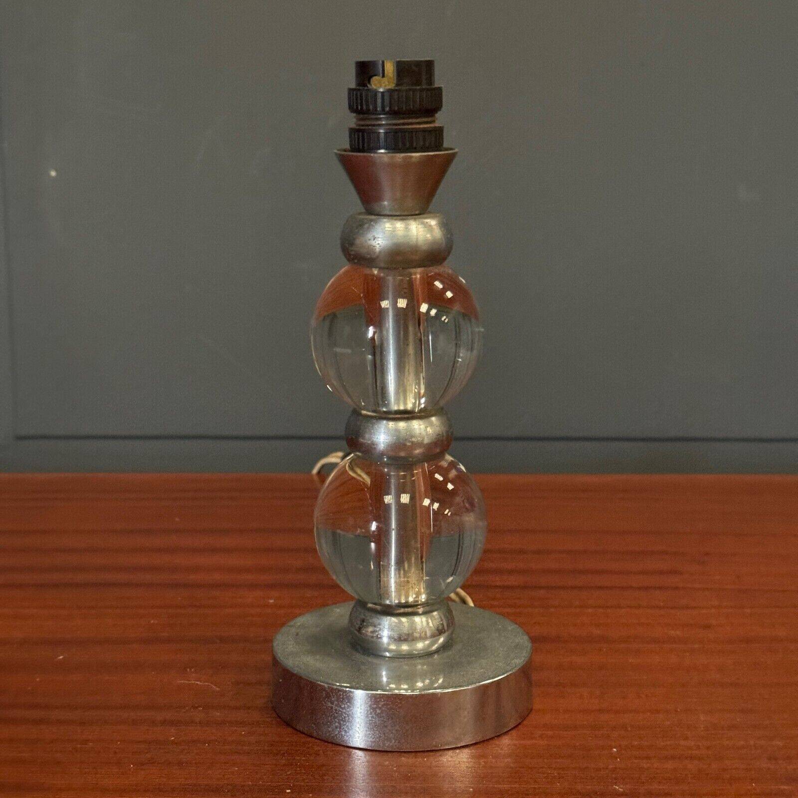 1950s lamp made up of two glass balls and a stainless steel base