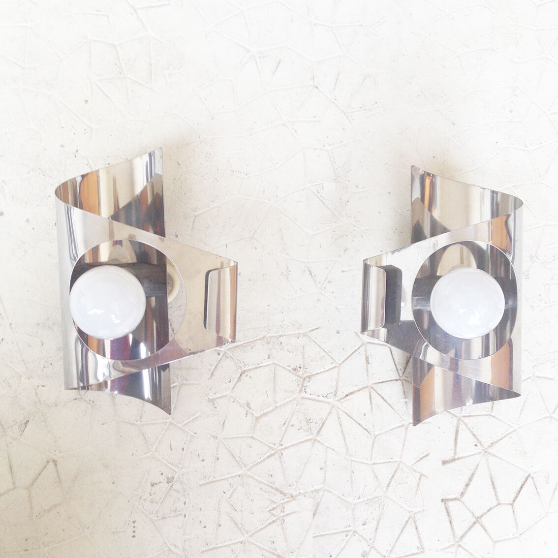 2 metal wall lights from the Maison Sciolari, Italy 1970