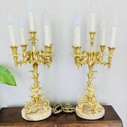 Chandeliers en bronze doré massif époque milieu XXe socles en marbre