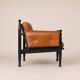 Paire de fauteuils lounge « safari » en cuir cognac et hêtre noir — c. 1970