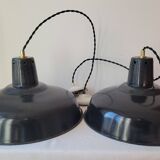 Duo of white and black enameled sheet metal pendants