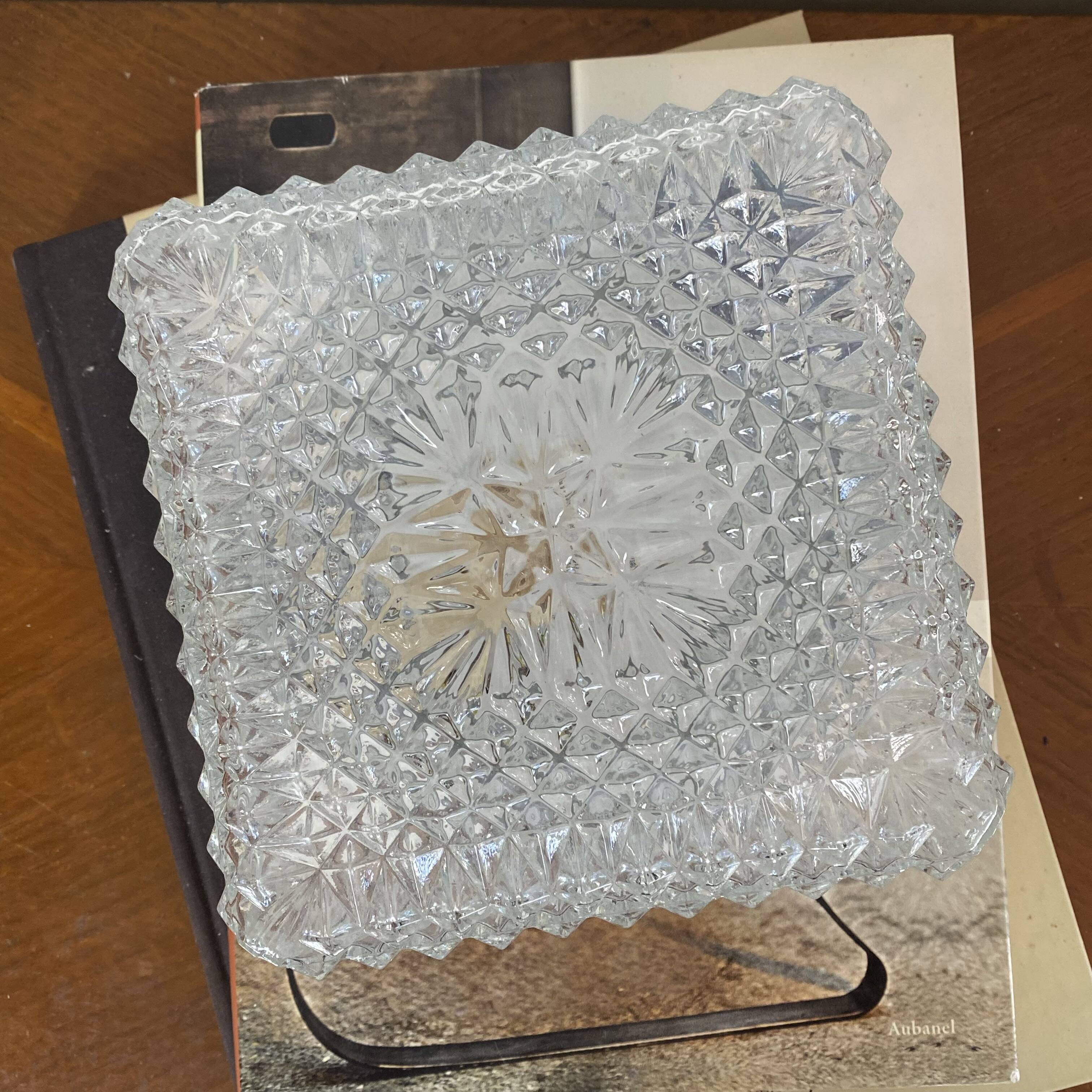 Small square wall-mounted ceiling light with transparent glass, vintage fixture.