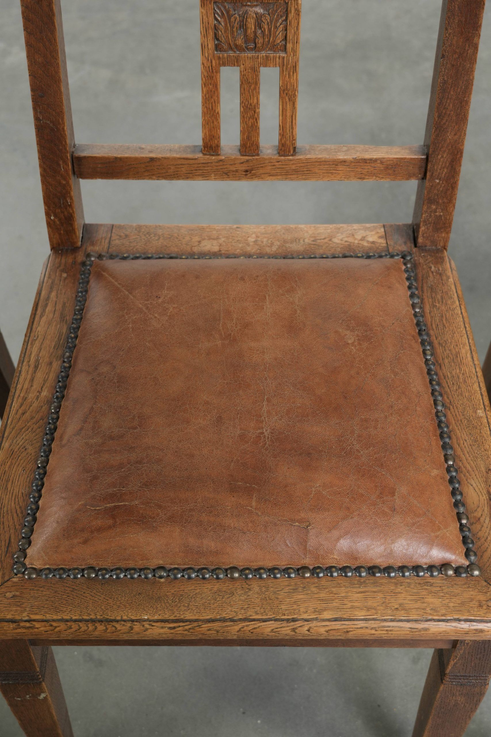Set of 4 antique oak dining chairs in Art Nouveau style with sheepskin