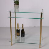 Hollywood Regency side table with gold-colored legs