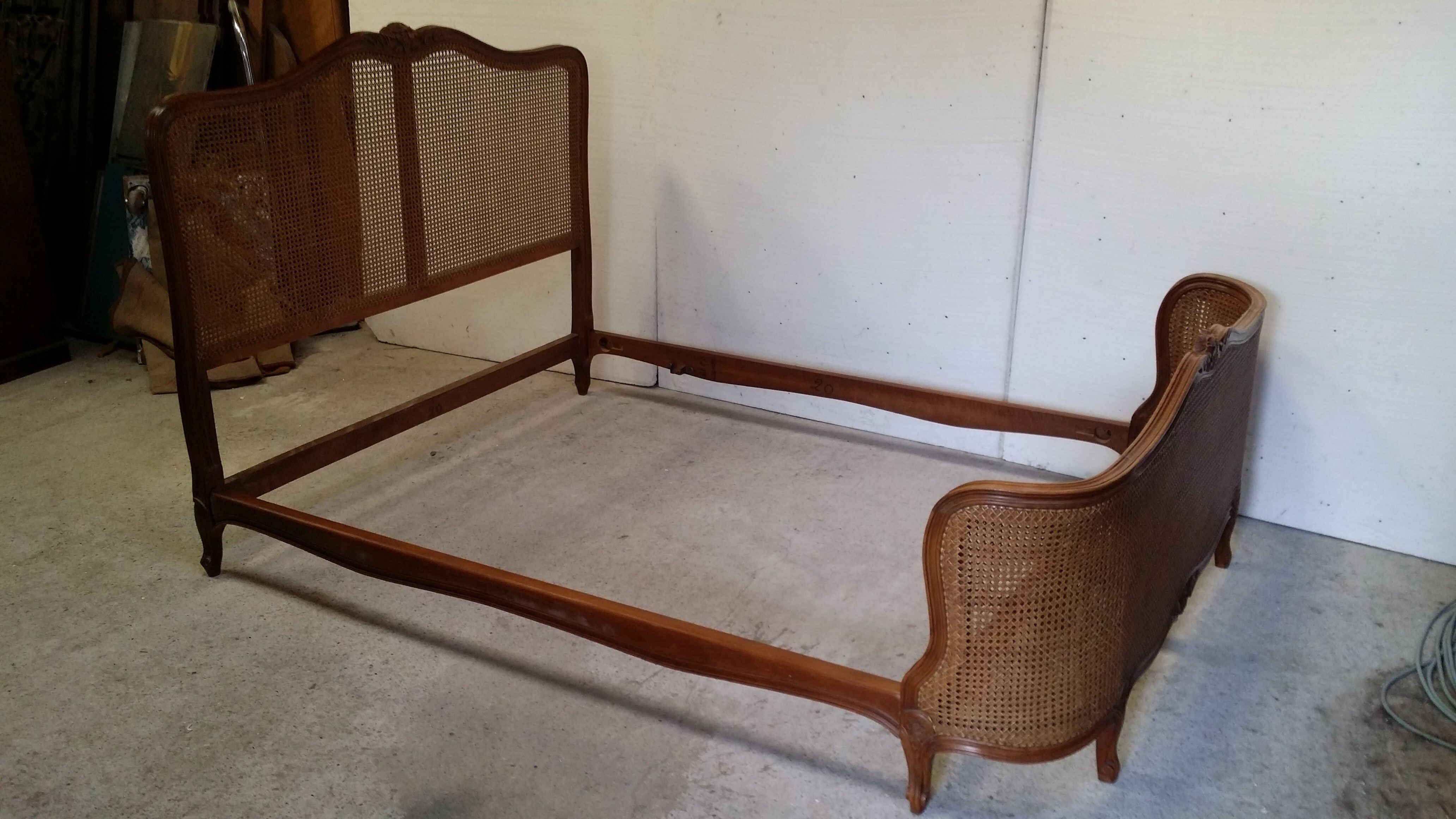 Wooden bed with canna bottom