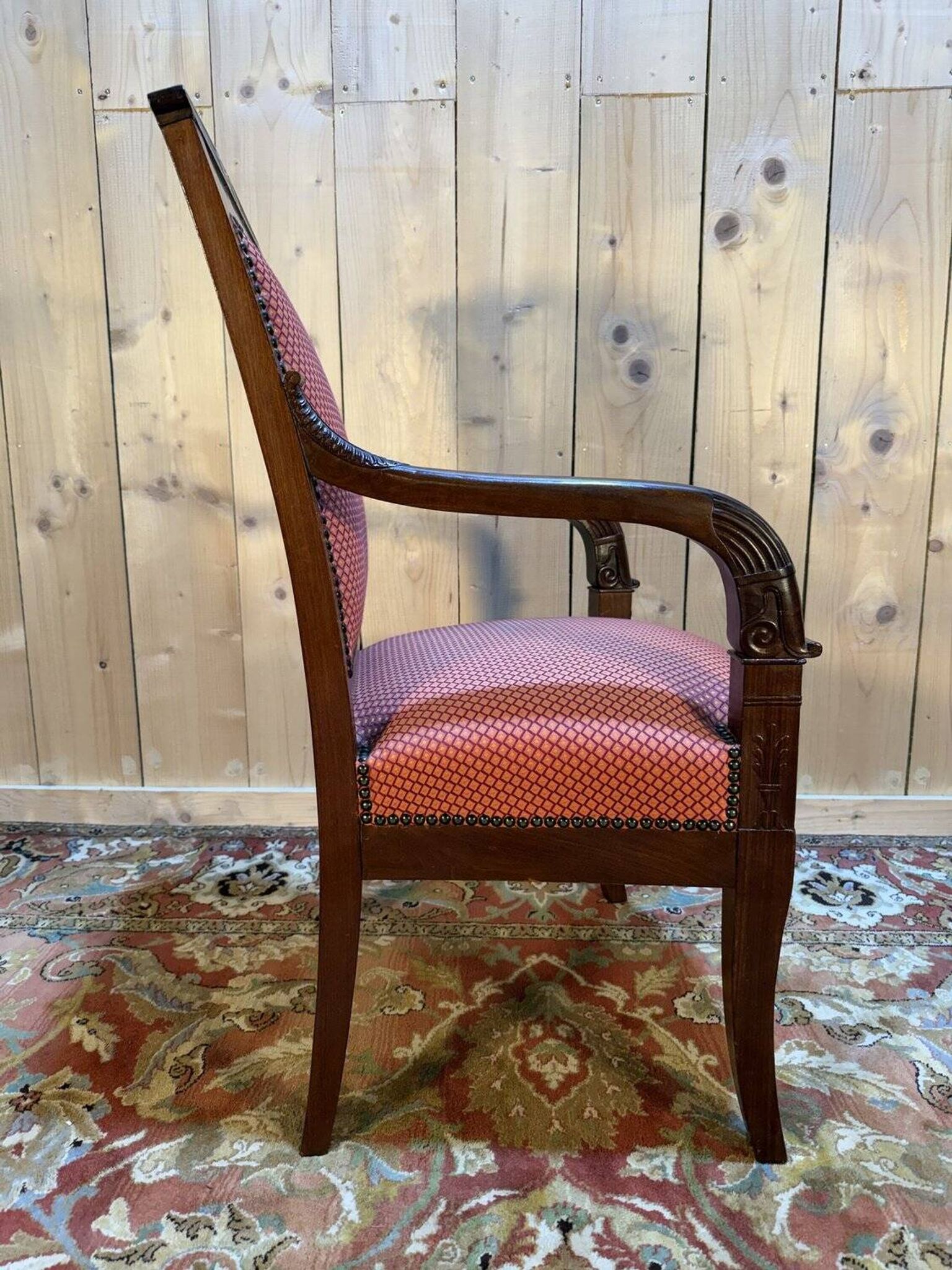 Fauteuil époque Empire en acajou pieds sabres