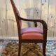 Empire period armchair in mahogany with saber legs.