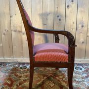 Fauteuil époque Empire en acajou pieds sabres