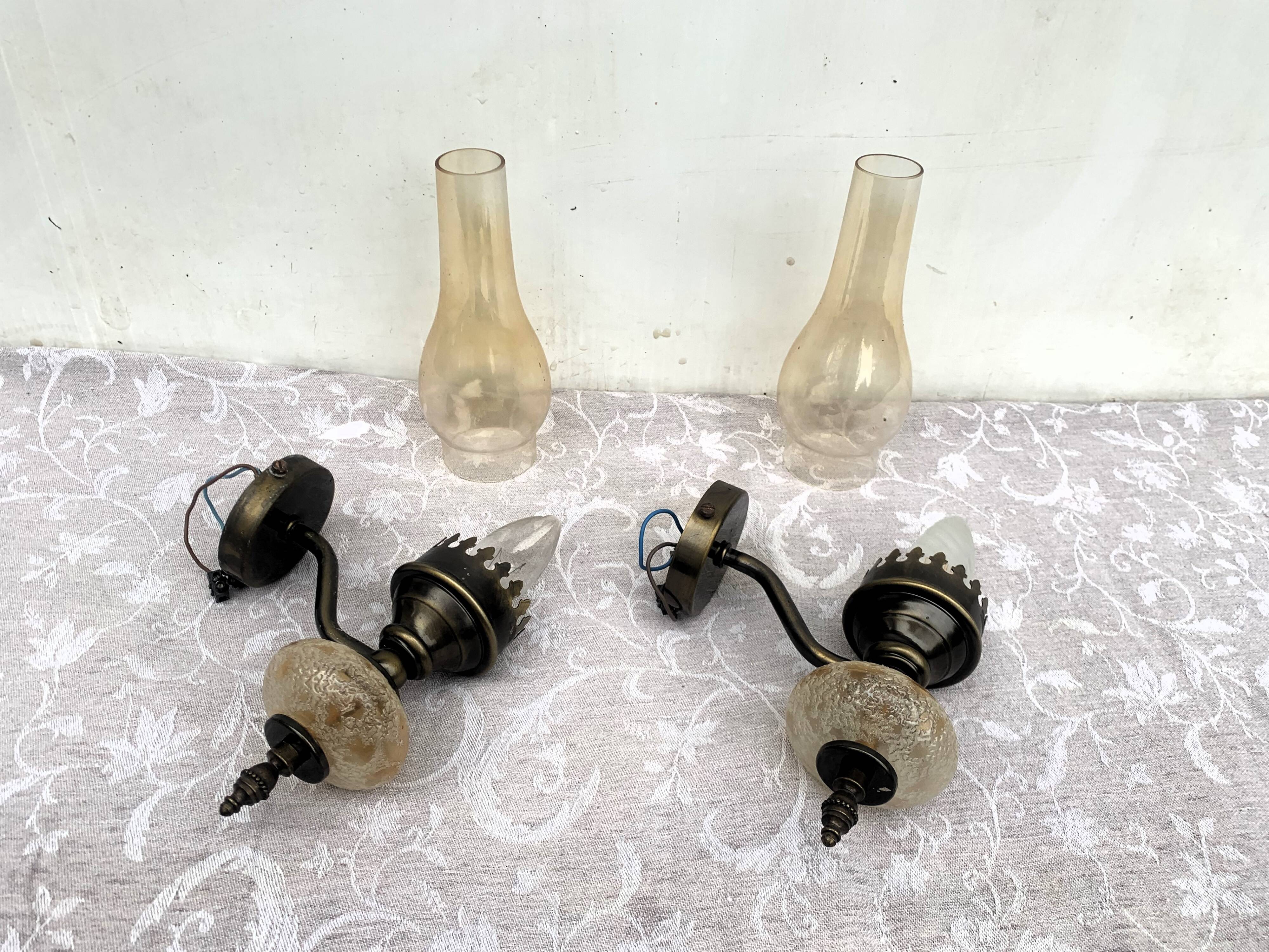 Matching pair of bronze wall sconces oil lamp style