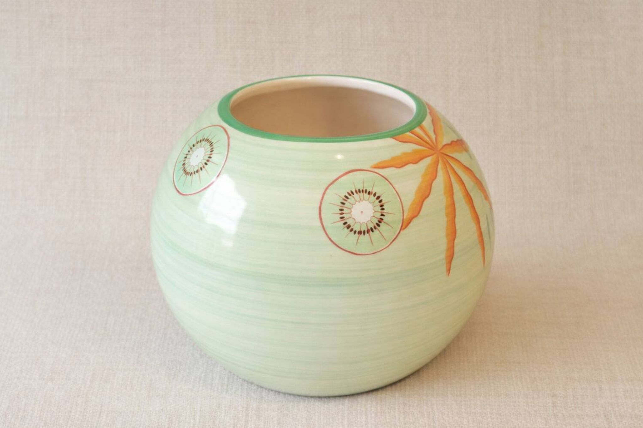 Lunéville France round vase – kiwi & leaf decoration – soft green vintage