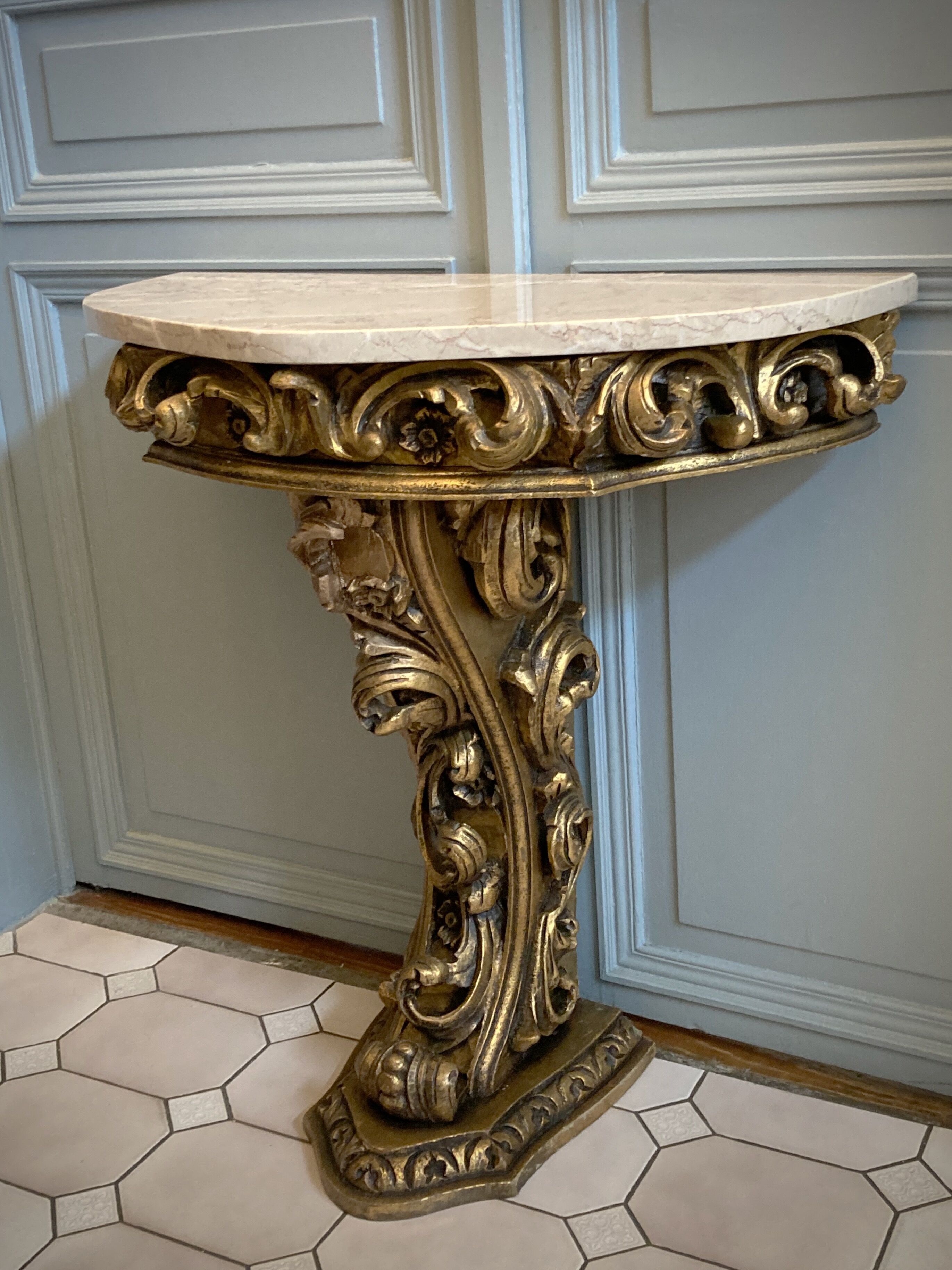 Carved wooden and marble console