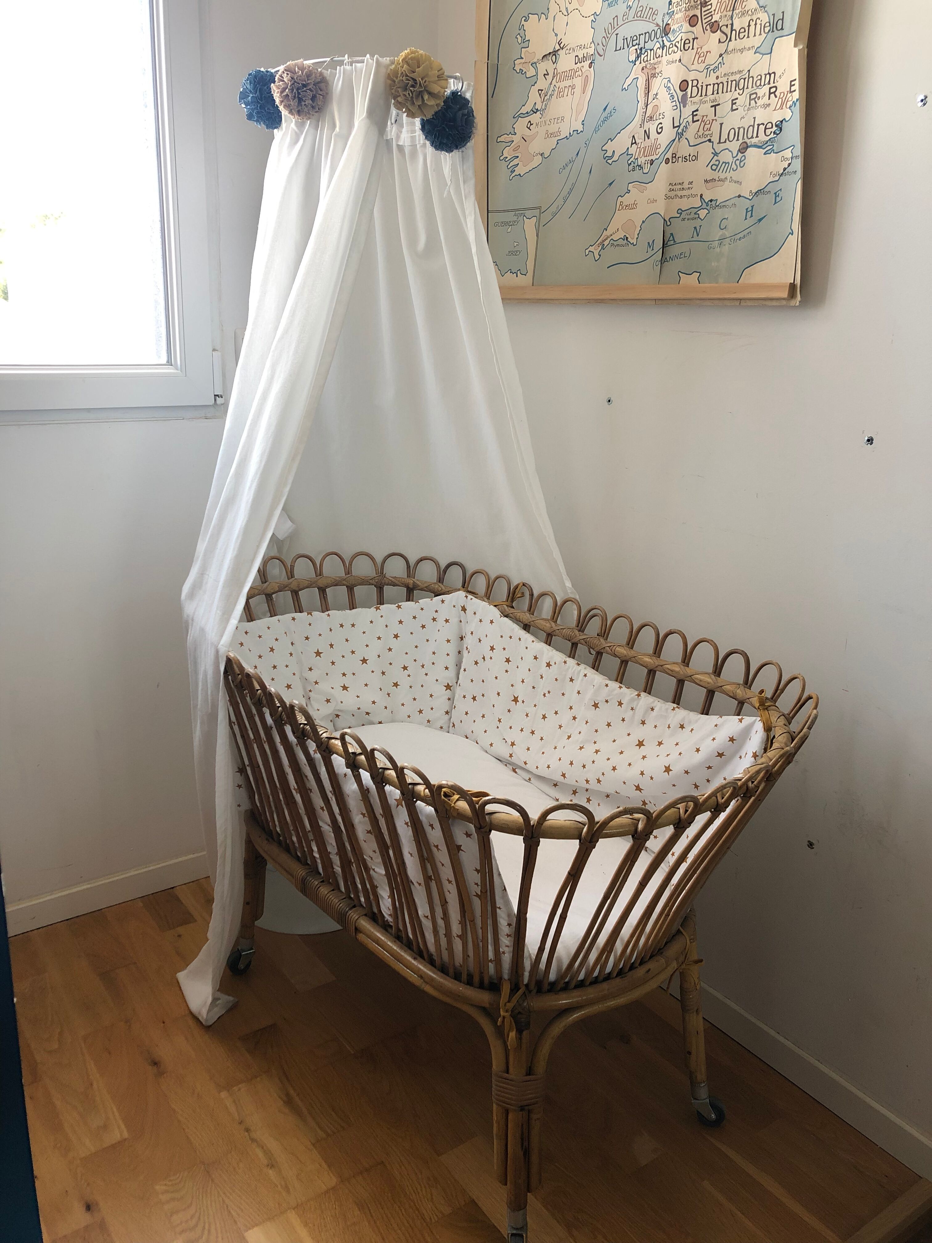 Vintage rattan cradle