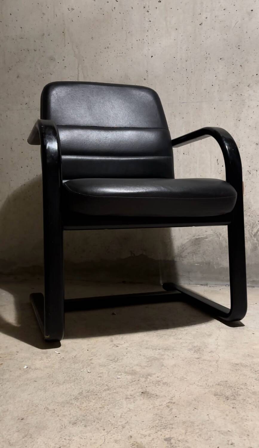 Vintage black leather armchair