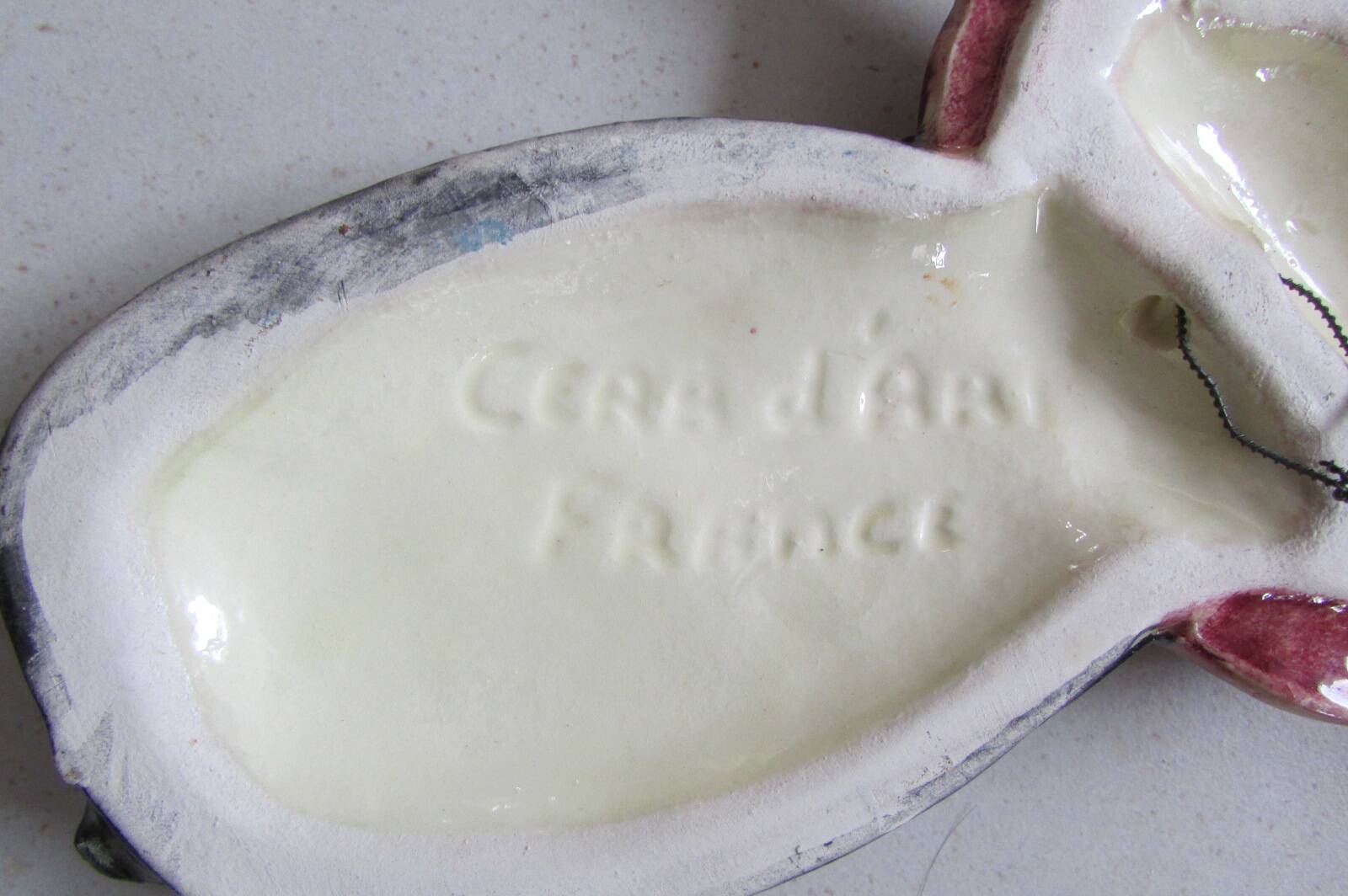 Couple of ceramic wall-mounted Arlesiennes