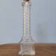 Vendôme column perfume bottle in moulded glass, 19th century.