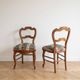 Pair of antique Louis XV style chairs in wood and floral fabric.
