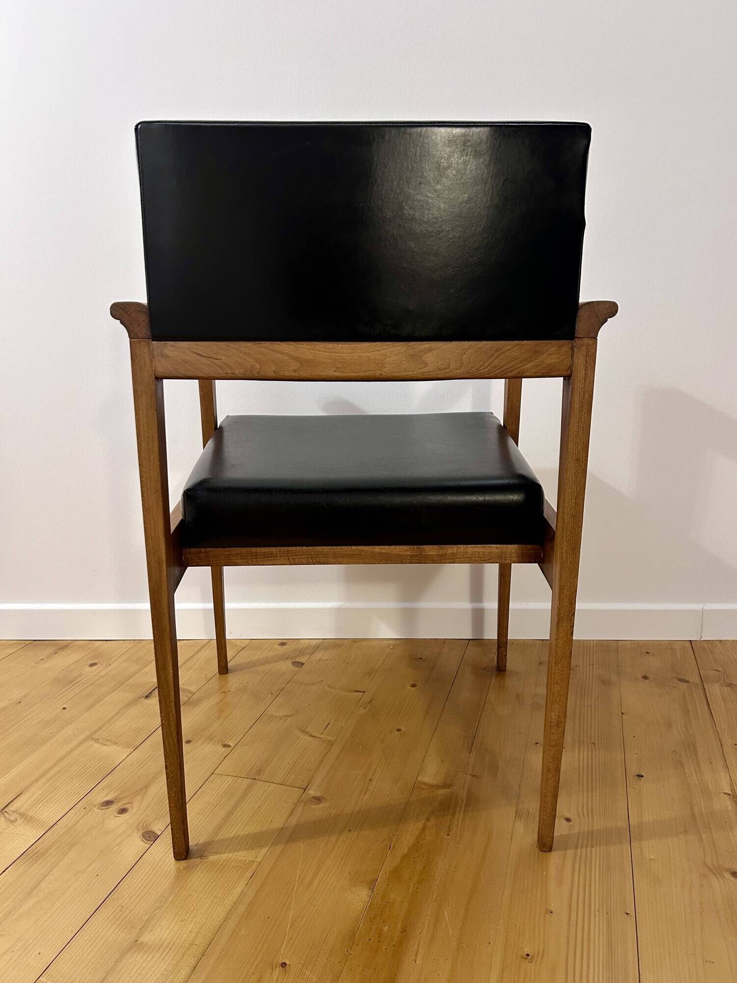 Mid-Century faux leather and wood armchair