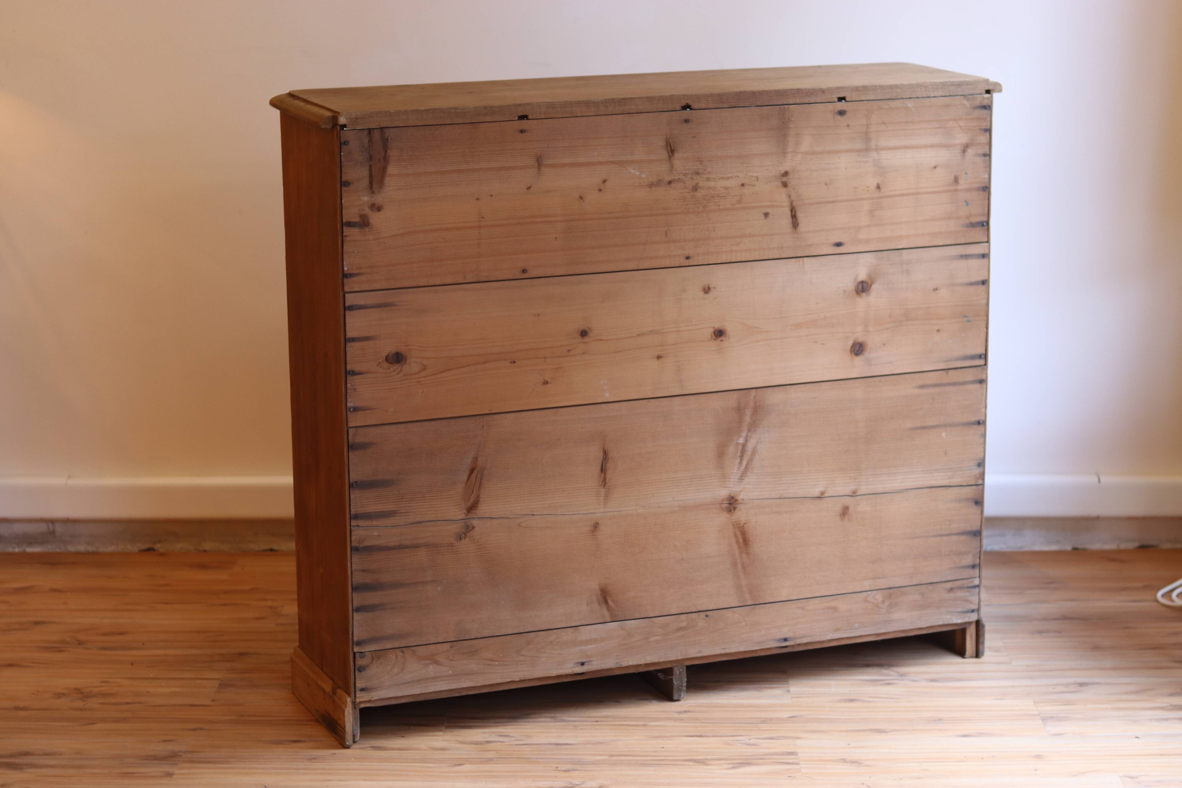 Large storage unit with compartments in waxed pine, early 20th century.