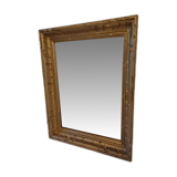 Wooden mirror and gold trim