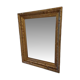 Wooden mirror and gold trim