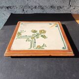 Vintage ceramic trivet – stylised floral design