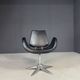 Alipes black swivel salon chair with chrome star base by Giorgetto Giugiaro