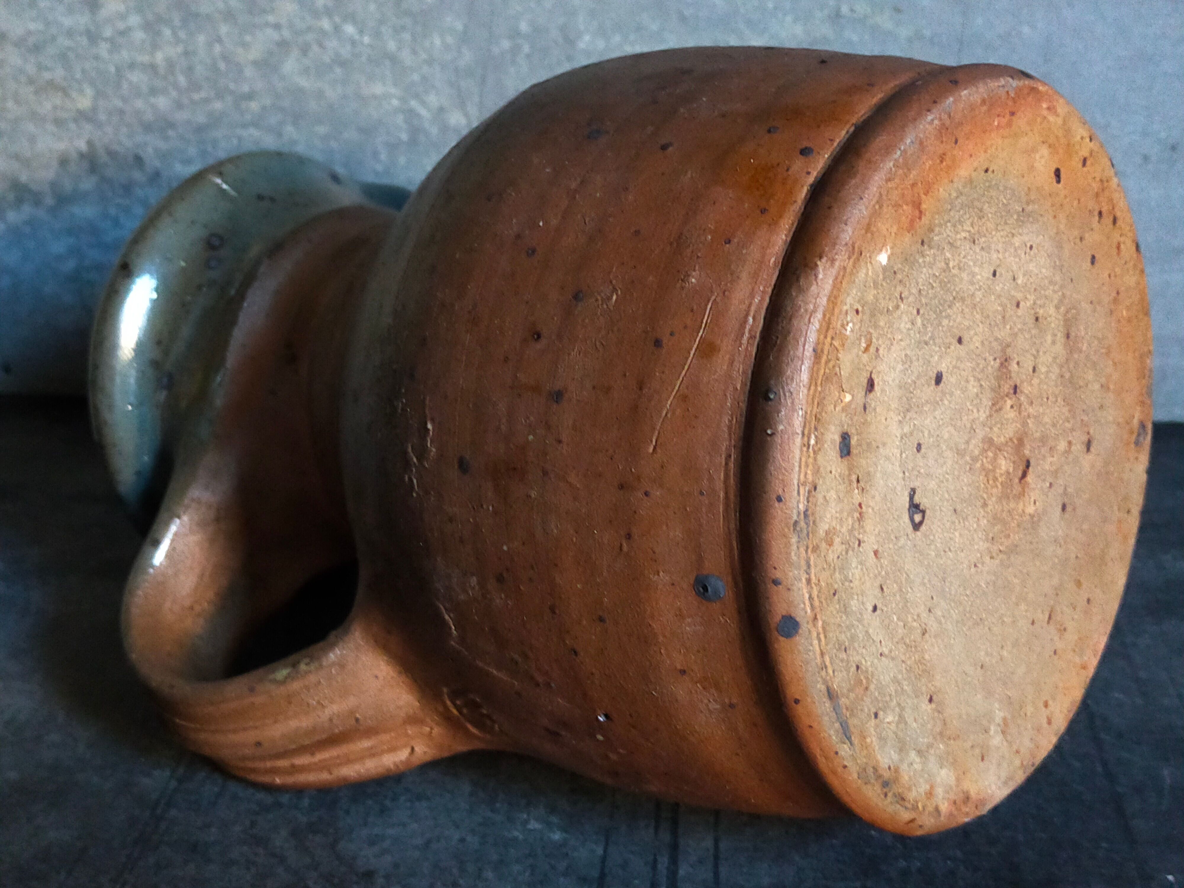 Pitcher traditional pottery Folk art in old enamelled sandstone