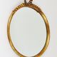 Round wall mirror in gilded wood, mid-century, C. Allodi & G. Subelli, Italy, 1950s.