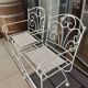 Paire de fauteuils en fer forgé