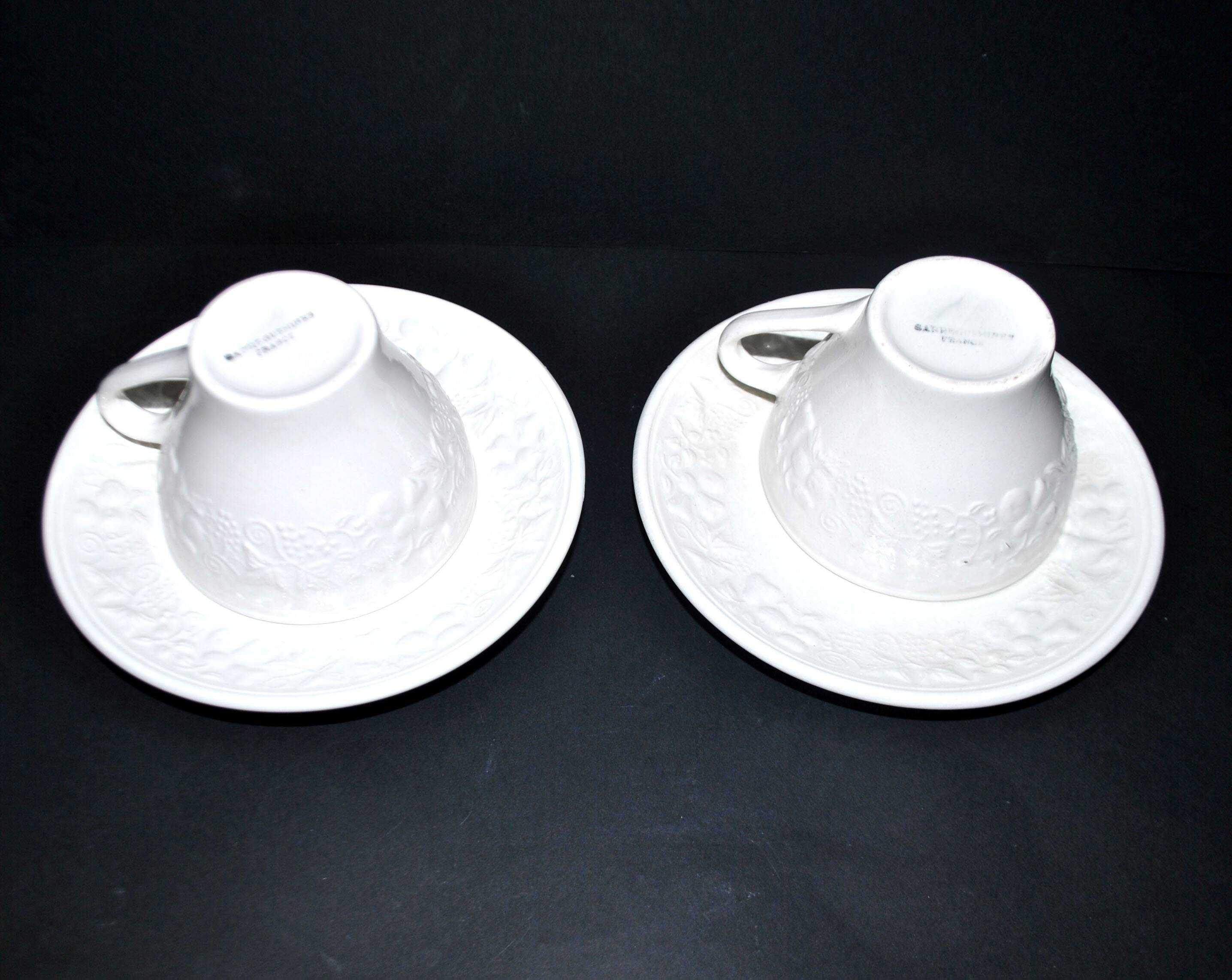 Set of 2 cups molded in opaque Sarreguemines earthenware