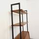 Vintage modular secretary bookshelf in teak and metal.