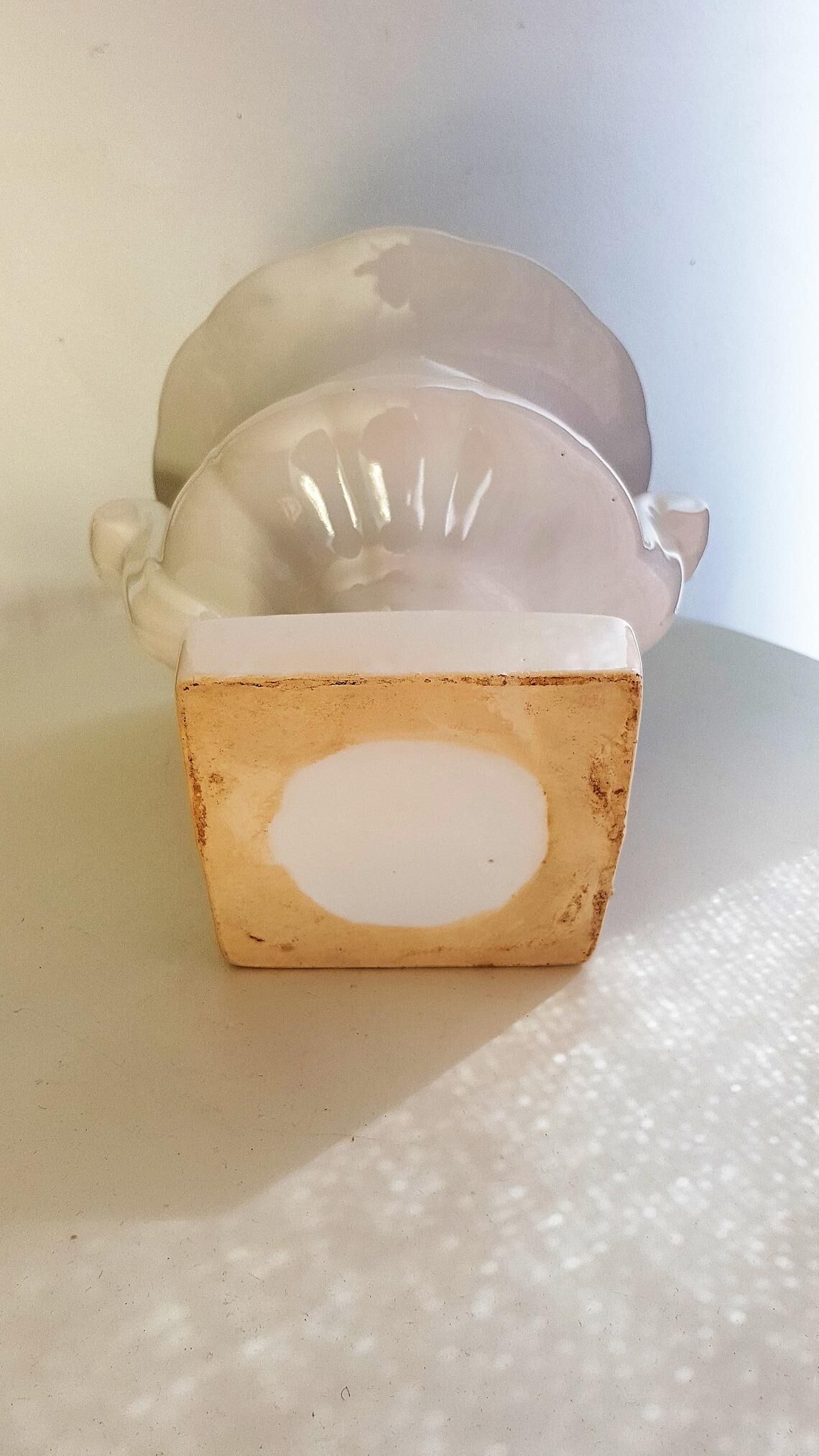 White ceramic medici-shaped planter