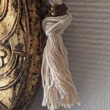 Art Deco oval mirror in gilded wood, France circa 1920