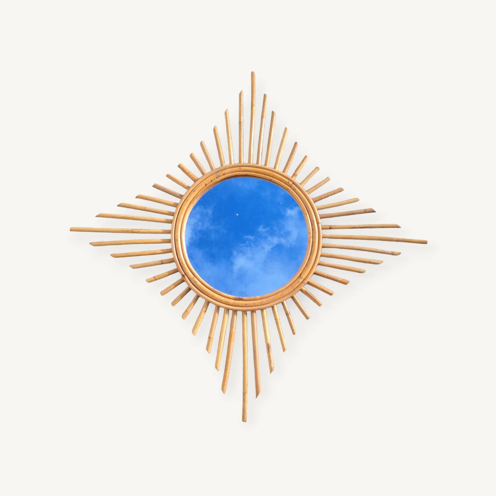 Vintage rattan sun mirror circa 1970