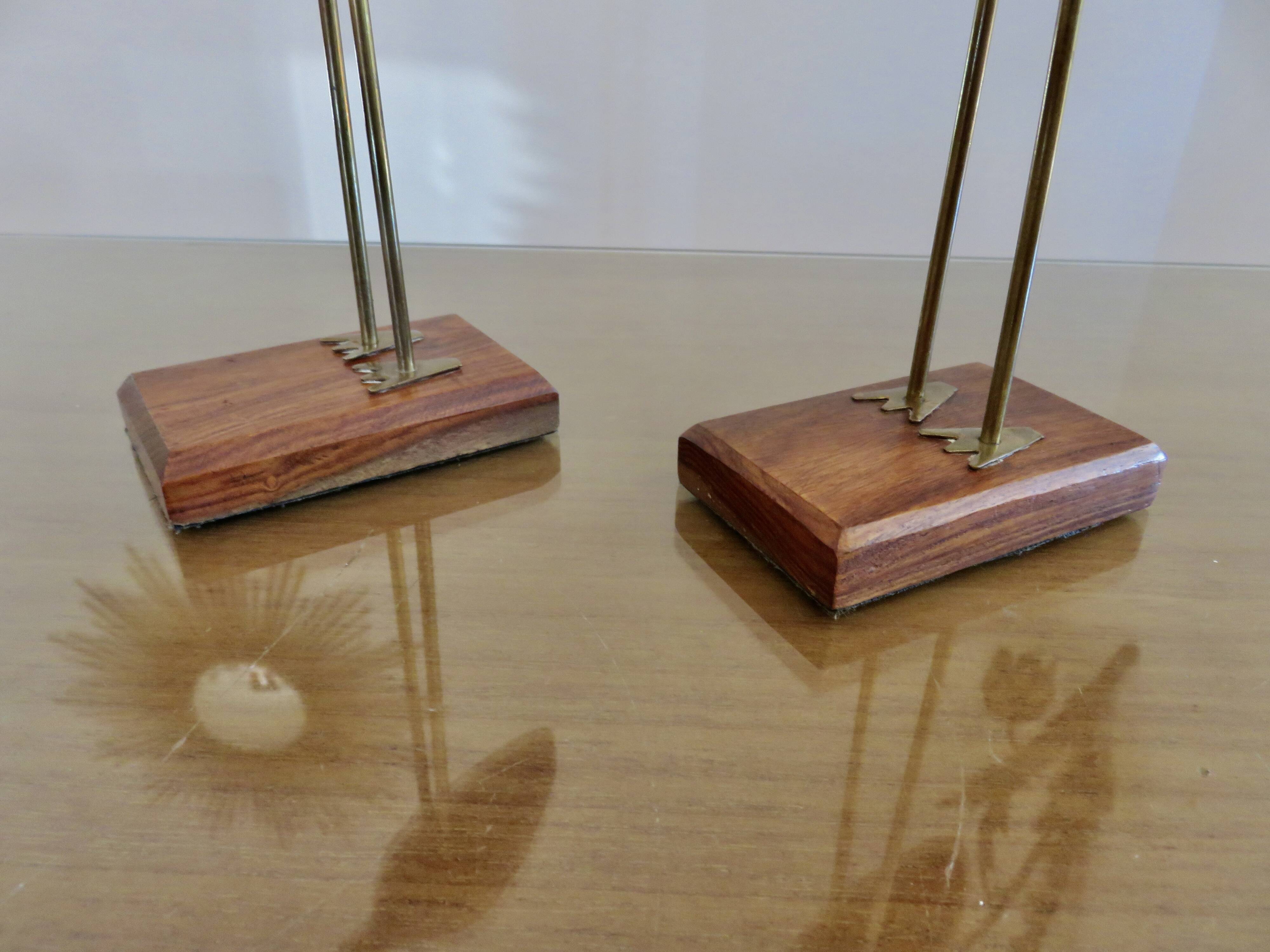Pair of teak and brass herons from the 70s