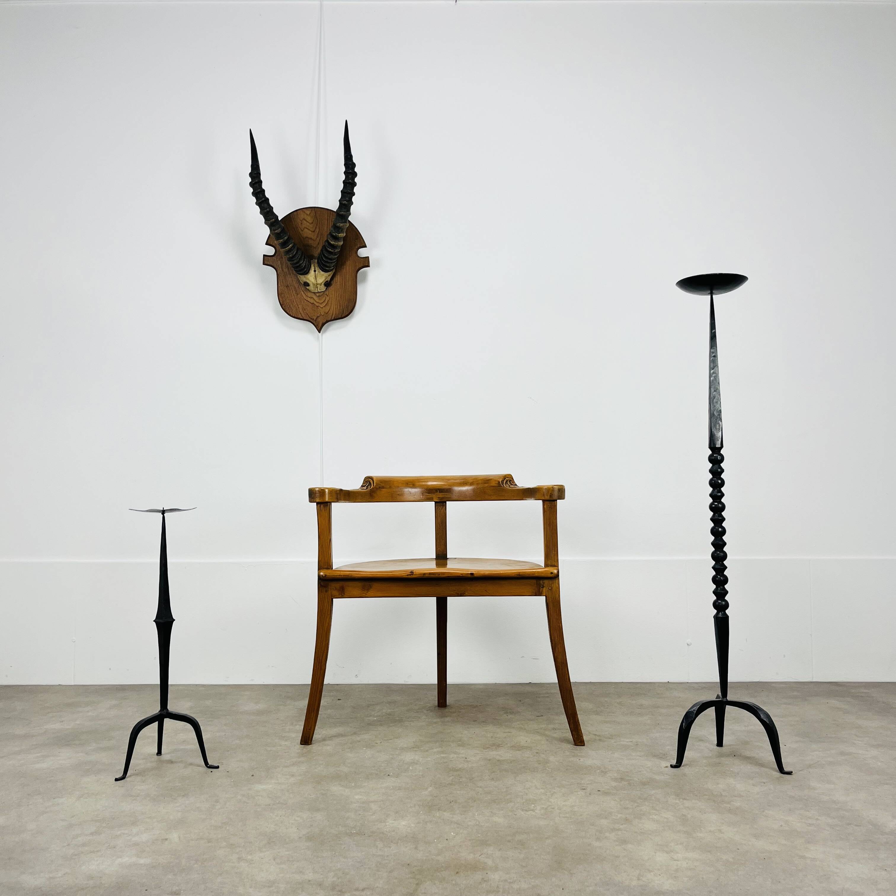 Chalet-style carved wooden tripod armchair