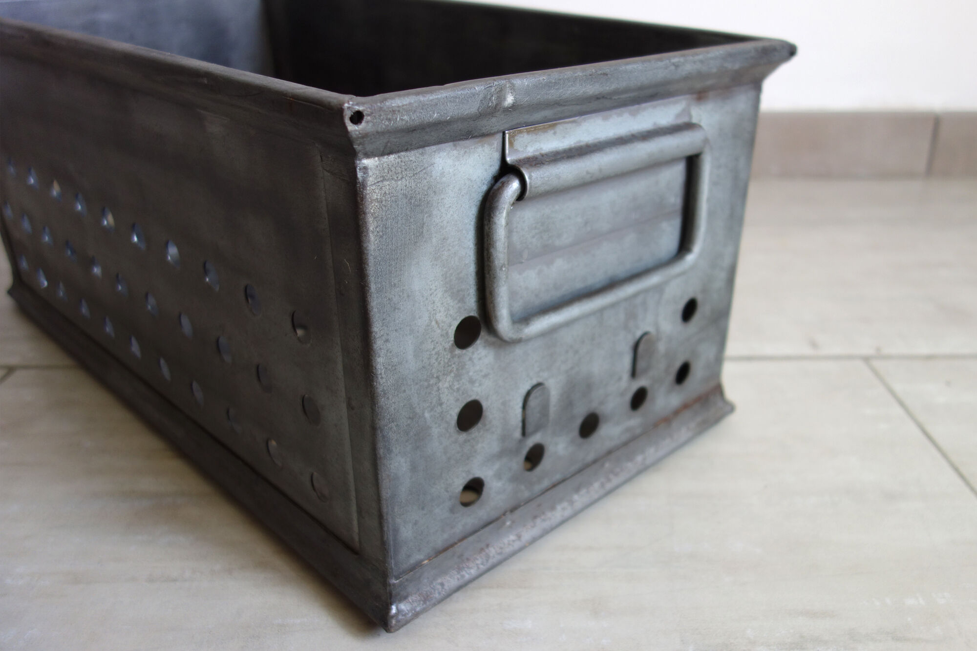 Old industrial box perfoated metal