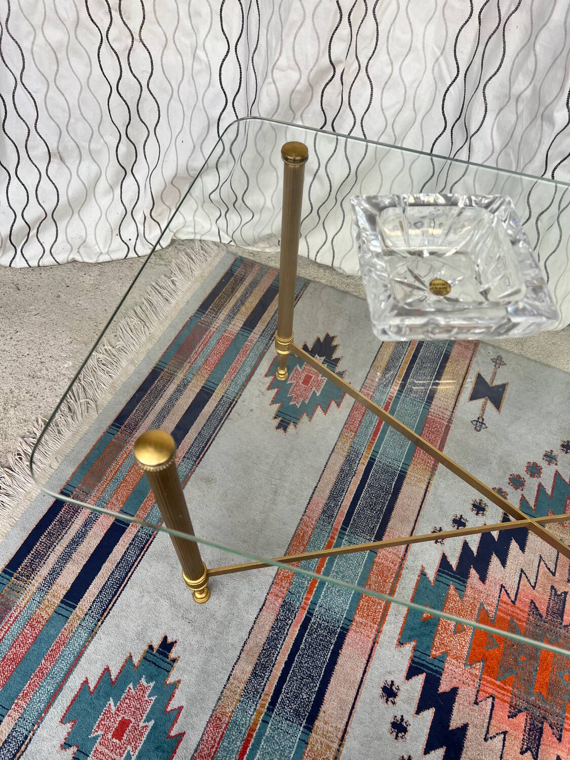 Vintage gold coffee table. Glass top.