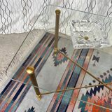Vintage gold coffee table. Glass top.