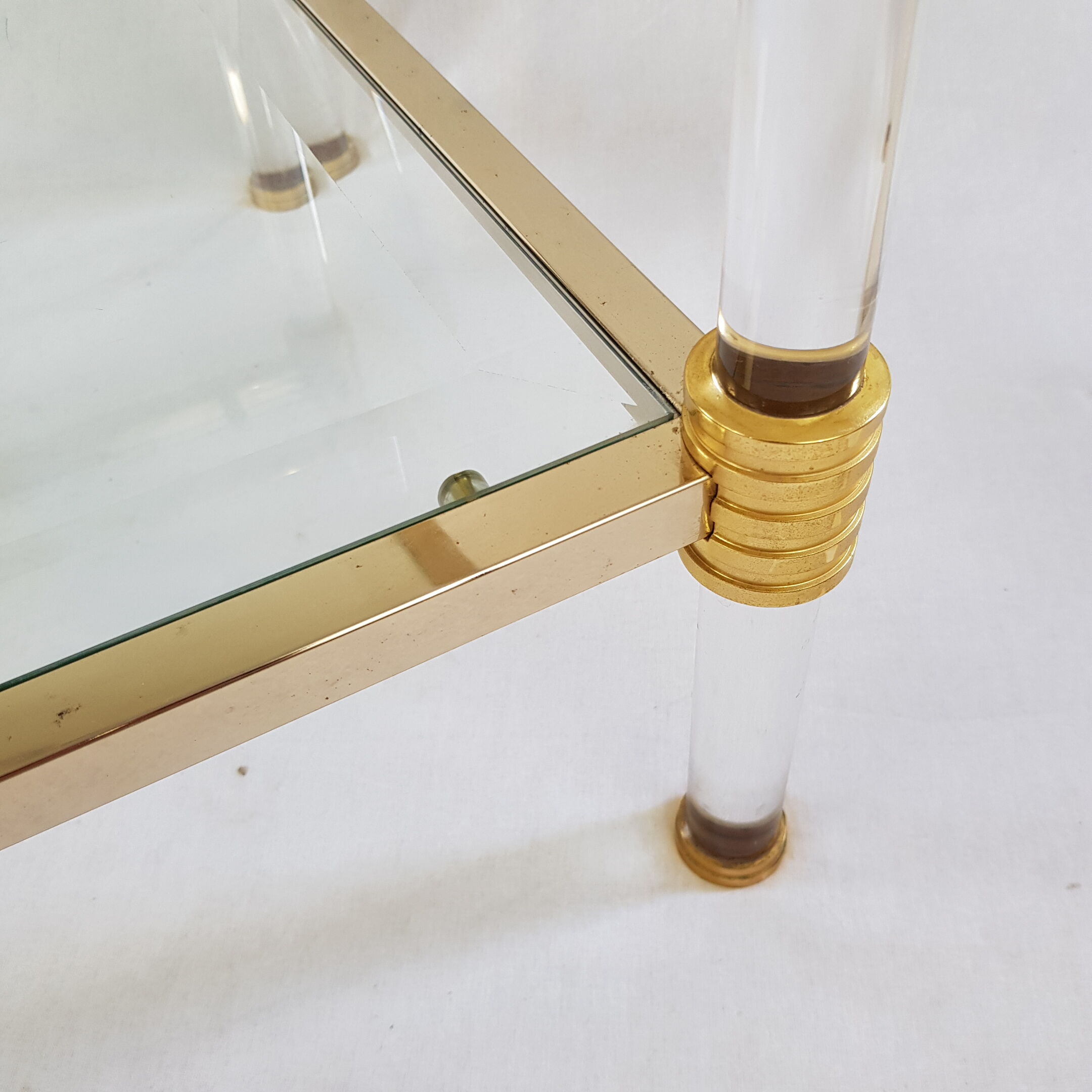 Coffee table in Lucite and Golden steel