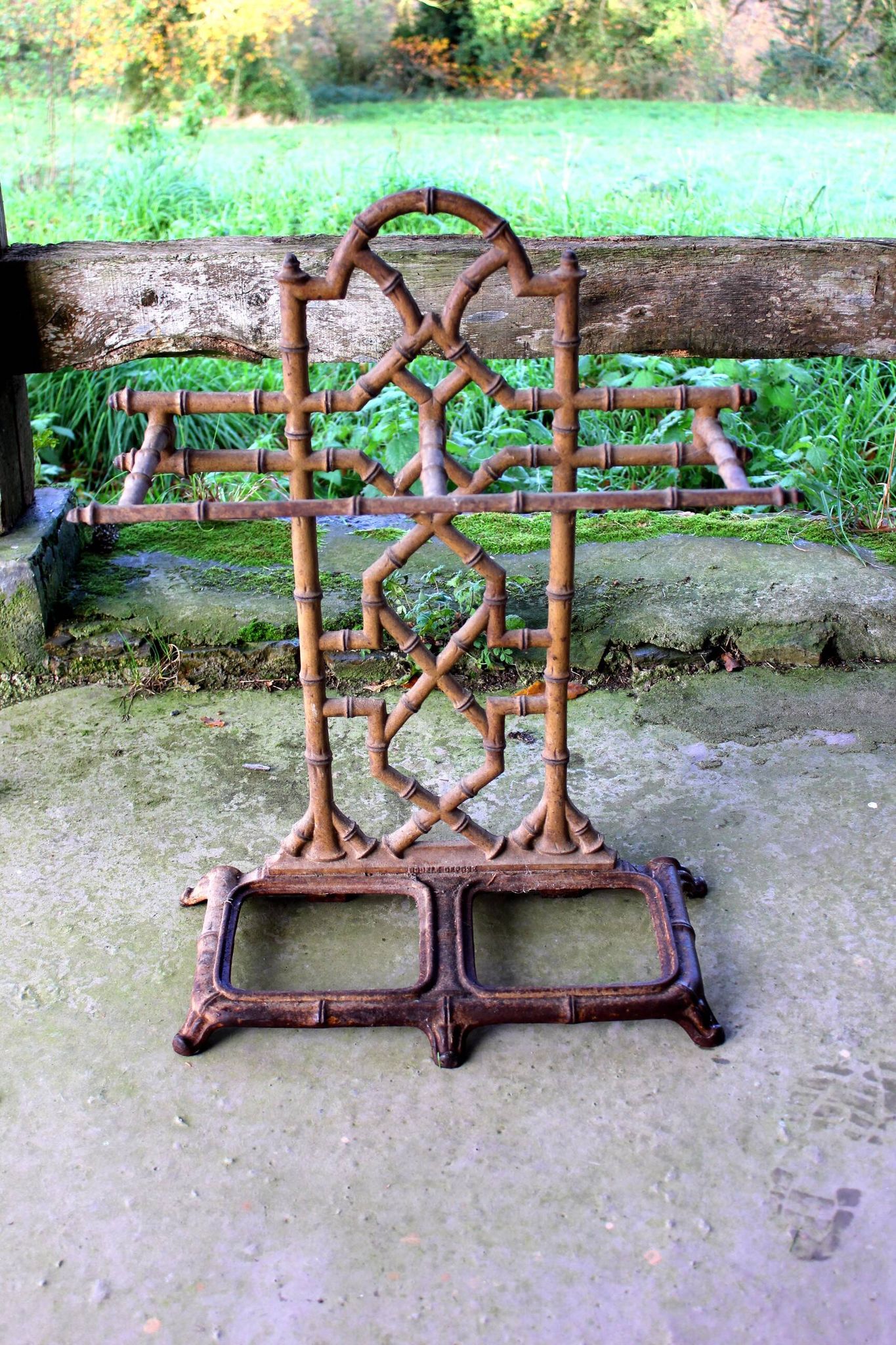 Vintage cast iron umbrella stand from the 1950s.