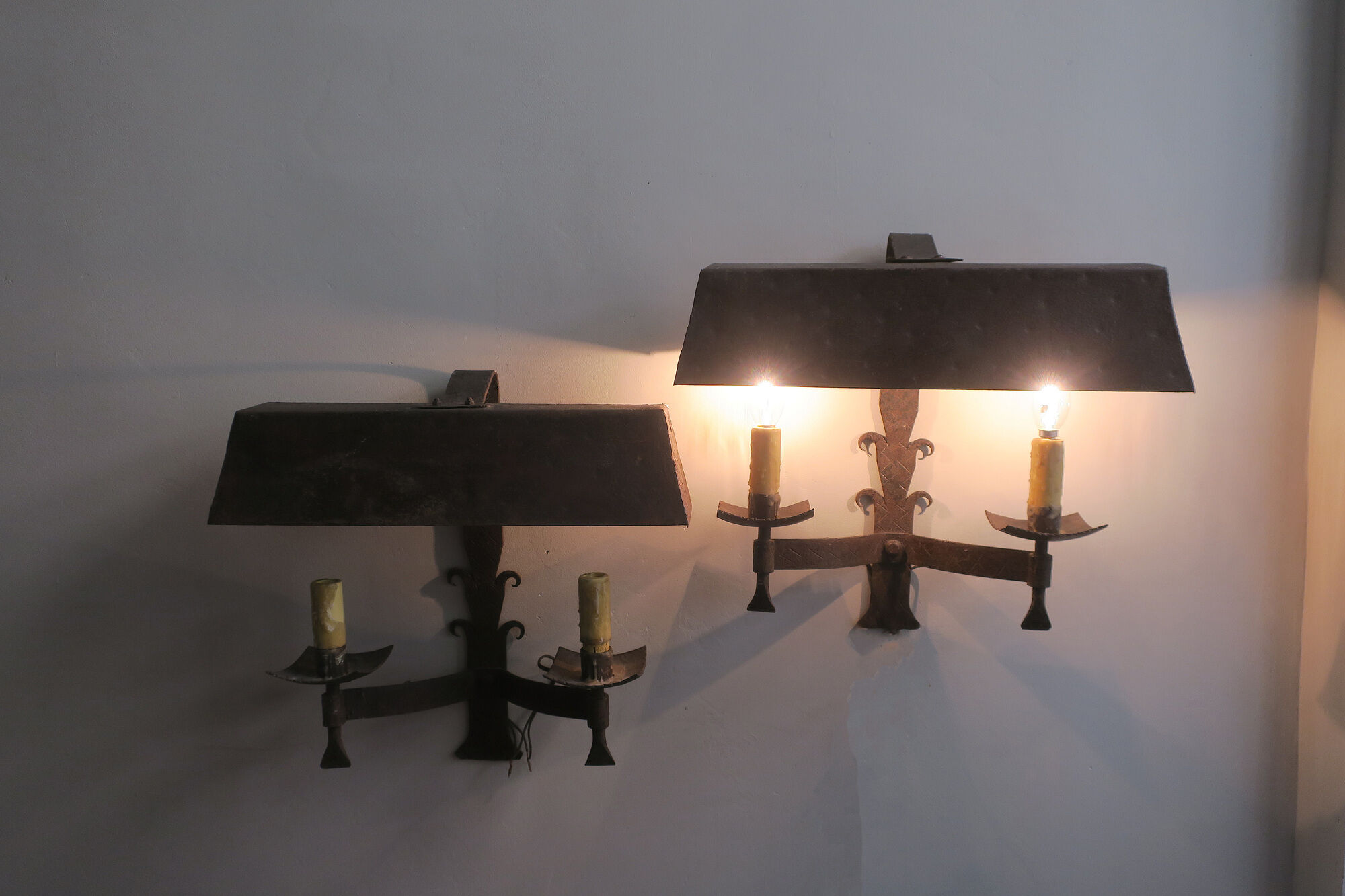 Pair of mid century patinated iron outdoor wall lights, 1960