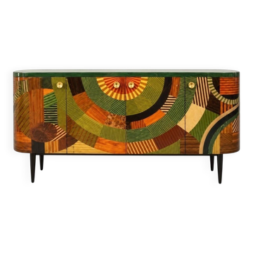 A beech wood Art Deco sideboard with polychrome marquetry.